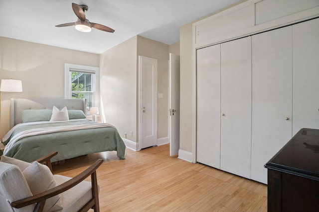 1511 Branston St, Saint Paul, MN 55108 - bedroom featuring light wood-style floors, a closet, and a ceiling fan