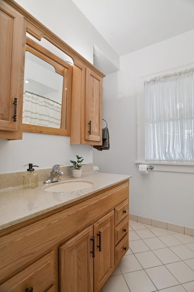 1511 Branston St, Saint Paul, MN 55108 - bathroom featuring vanity and baseboards