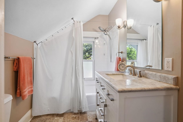 1511 Branston St, Saint Paul, MN 55108 - bathroom with vaulted ceiling, shower / bathtub combination with curtain, healthy amount of natural light, and vanity
