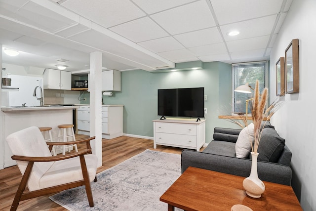 1511 Branston St, Saint Paul, MN 55108 - living room featuring light wood-type flooring and baseboards