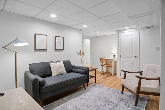1511 Branston St, Saint Paul, MN 55108 - living area featuring light wood finished floors, recessed lighting, and a drop ceiling