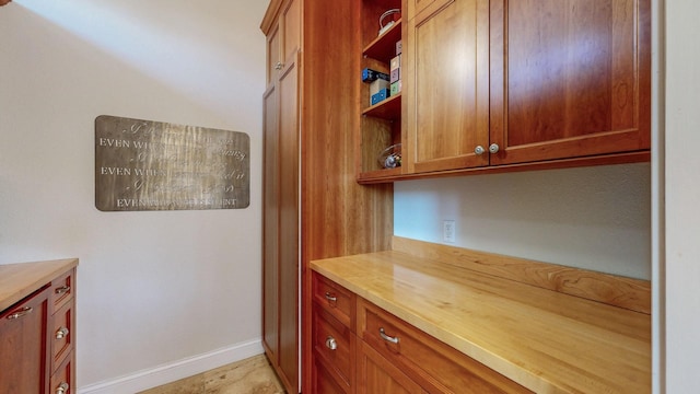 830 Prairie Island Rd N, Winona, MN 55987 - kitchen featuring open shelves, wood counters, and brown cabinets