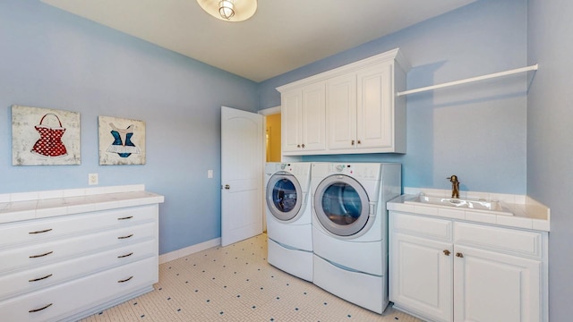 830 Prairie Island Rd N, Winona, MN 55987 - laundry area with cabinet space, separate washer and dryer, and light floors