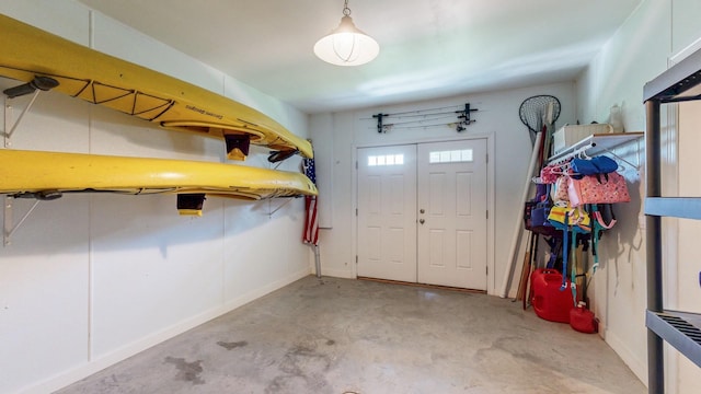 830 Prairie Island Rd N, Winona, MN 55987 - foyer entrance featuring concrete floors and baseboards
