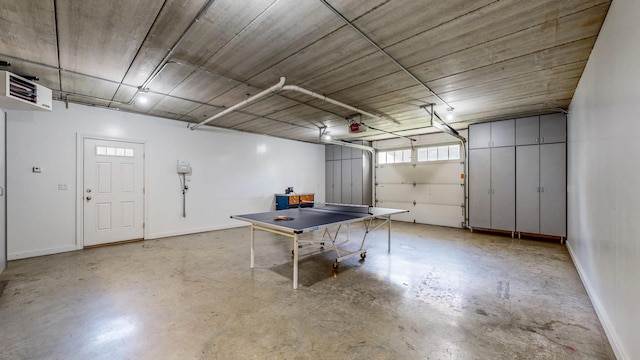 830 Prairie Island Rd N, Winona, MN 55987 - garage featuring a heating unit and a garage door opener