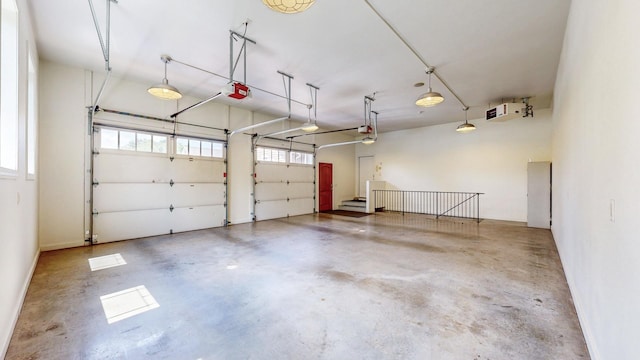 830 Prairie Island Rd N, Winona, MN 55987 - garage featuring a garage door opener