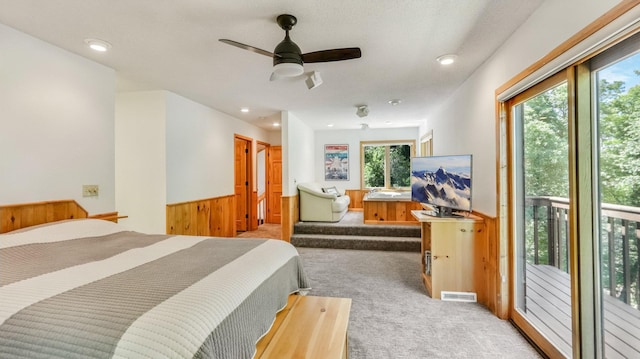 2756 7 5/8 Ave, Chetek, WI 54728 - bedroom featuring carpet floors, access to outside, a wainscoted wall, recessed lighting, and a ceiling fan