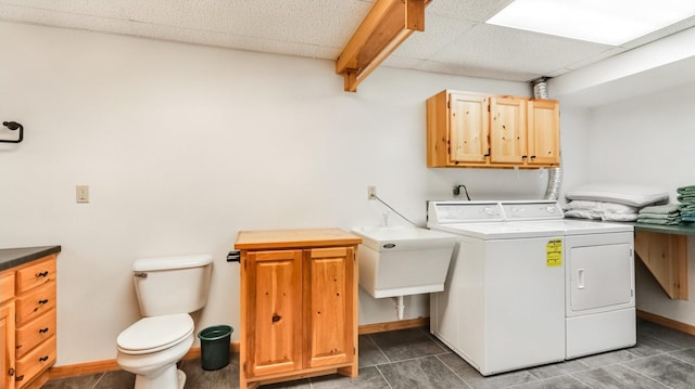 2756 7 5/8 Ave, Chetek, WI 54728 - laundry area featuring separate washer and dryer and tile patterned flooring