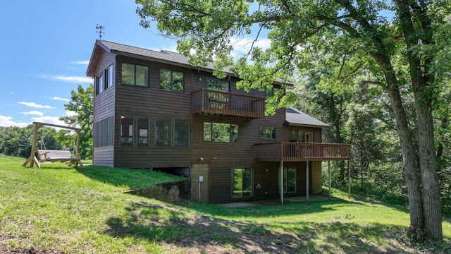 2756 7 5/8 Ave, Chetek, WI 54728 - rear view of property with a yard, a balcony, and a wooden deck
