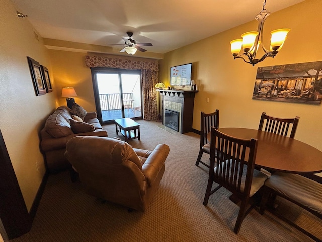 502 Cleveland Blvd W Unit 2300, Walker, MN 56484 - living area with carpet floors, a ceiling fan, a chandelier, and a tiled fireplace