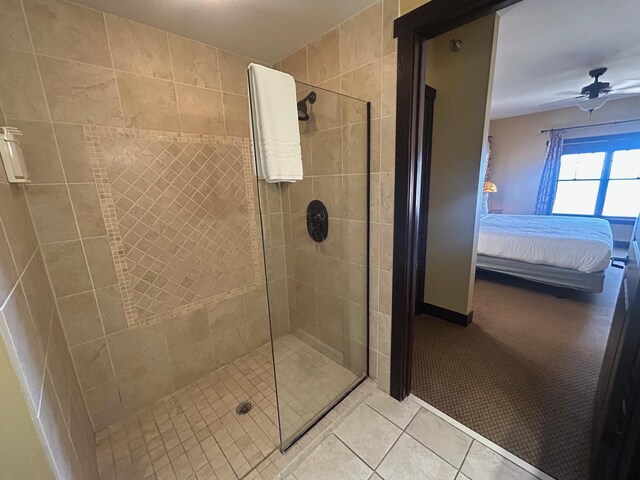 502 Cleveland Blvd W Unit 2300, Walker, MN 56484 - ensuite bathroom with tile patterned flooring, a tile shower, and ceiling fan
