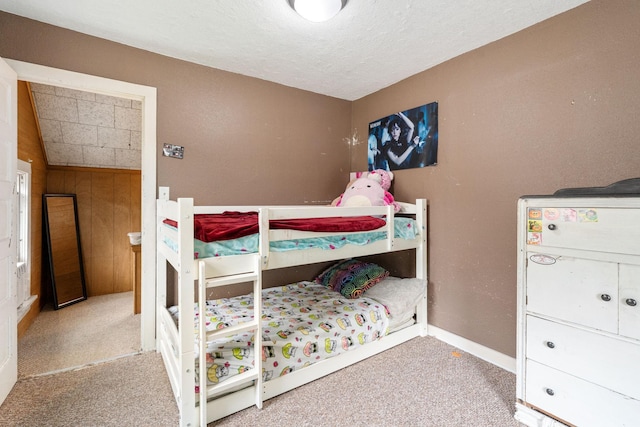 208 12th St SE, Austin, MN 55912 - bedroom featuring carpet and a textured ceiling