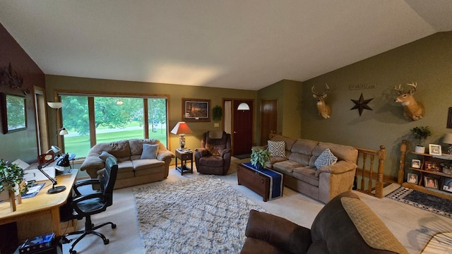 2145 Kenneth Dr, Albert Lea, MN 56007 - carpeted living room featuring lofted ceiling and a desk