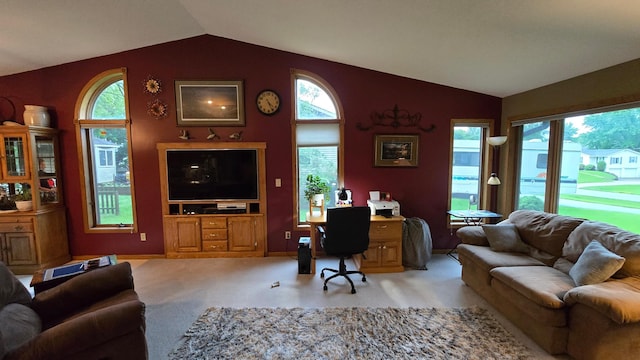 2145 Kenneth Dr, Albert Lea, MN 56007 - living room featuring lofted ceiling, light colored carpet, and a desk