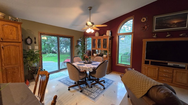 2145 Kenneth Dr, Albert Lea, MN 56007 - dining room with light floors, ceiling fan, and lofted ceiling