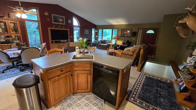 2145 Kenneth Dr, Albert Lea, MN 56007 - kitchen featuring dishwasher, lofted ceiling, open floor plan, light countertops, and ceiling fan