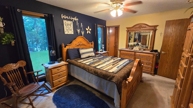 2145 Kenneth Dr, Albert Lea, MN 56007 - bedroom featuring light colored carpet and ceiling fan