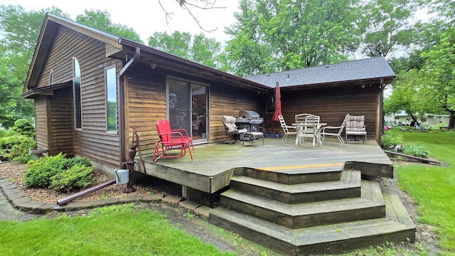 2145 Kenneth Dr, Albert Lea, MN 56007 - deck with a grill and a lawn