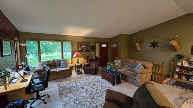 2145 Kenneth Dr, Albert Lea, MN 56007 - carpeted living area with vaulted ceiling and a desk