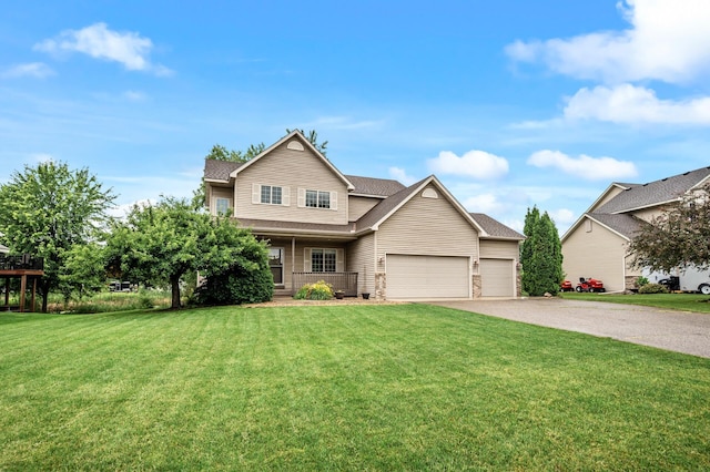 2403 Meadow Dr, Buffalo, MN 55313 - view of front facade featuring a garage, asphalt driveway, a front yard, a porch, and roof with shingles