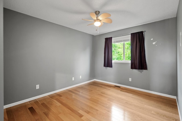 2403 Meadow Dr, Buffalo, MN 55313 - empty room with light wood-type flooring and ceiling fan