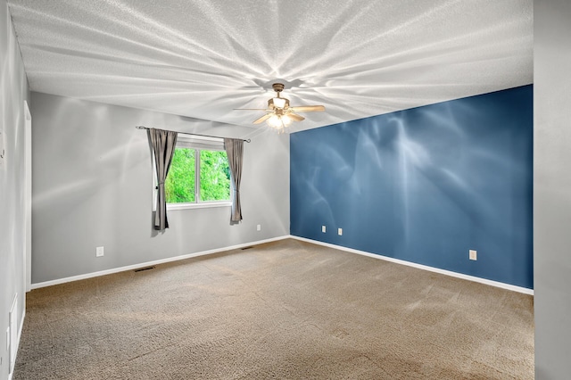 2403 Meadow Dr, Buffalo, MN 55313 - carpeted empty room featuring a textured ceiling and ceiling fan