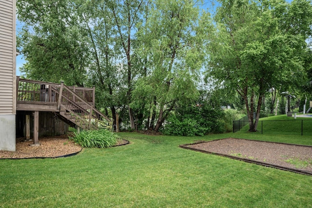 2403 Meadow Dr, Buffalo, MN 55313 - view of yard featuring stairs, a wooden deck, and view of wooded area