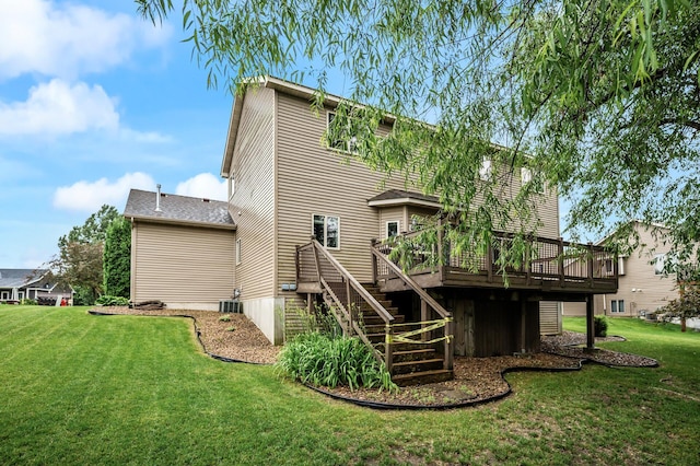 2403 Meadow Dr, Buffalo, MN 55313 - rear view of house with a wooden deck, stairway, and a lawn