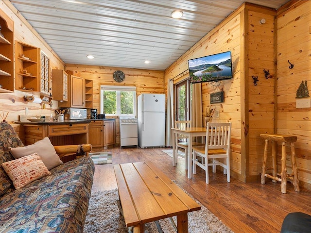 33638 Anderson Ct, Crosslake, MN 56442 - living area with wooden walls, light wood finished floors, recessed lighting, and wood ceiling