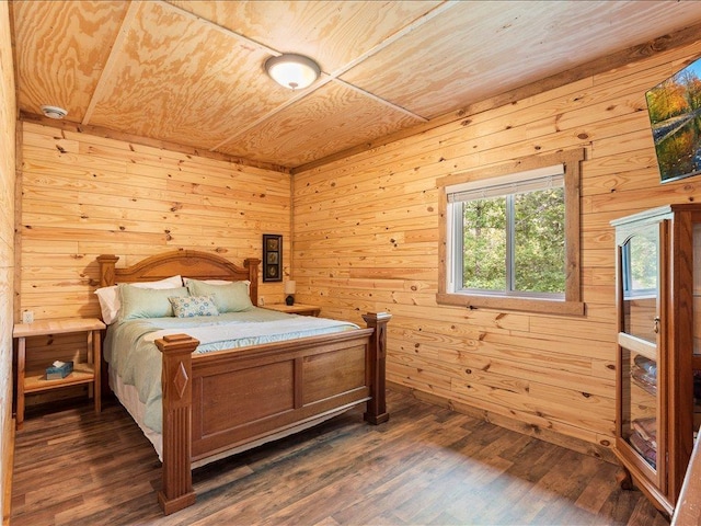 33638 Anderson Ct, Crosslake, MN 56442 - bedroom with wooden ceiling, wood walls, and dark wood finished floors
