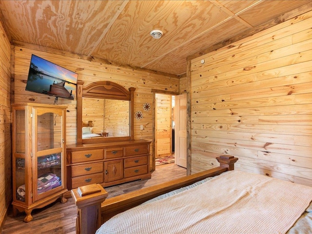 33638 Anderson Ct, Crosslake, MN 56442 - bedroom featuring wood walls, wooden ceiling, and wood finished floors