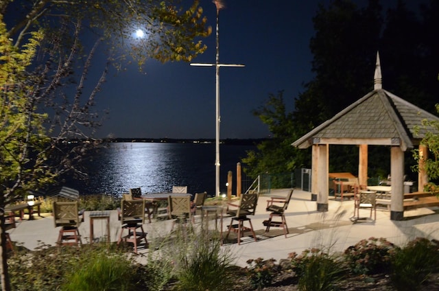 4387 Wilshire Blvd Unit 307, Mound, MN 55364 - patio at twilight with a gazebo, a water view, and a patio area