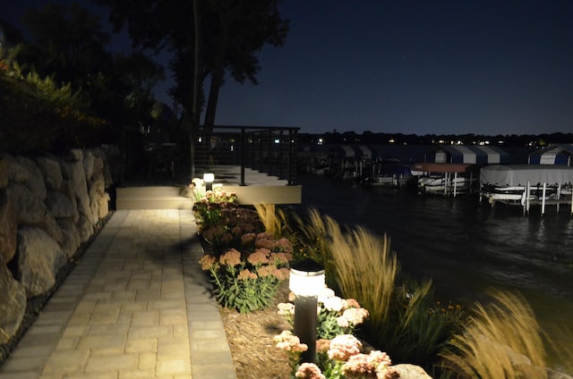 4387 Wilshire Blvd Unit 307, Mound, MN 55364 - patio at night with a boat dock