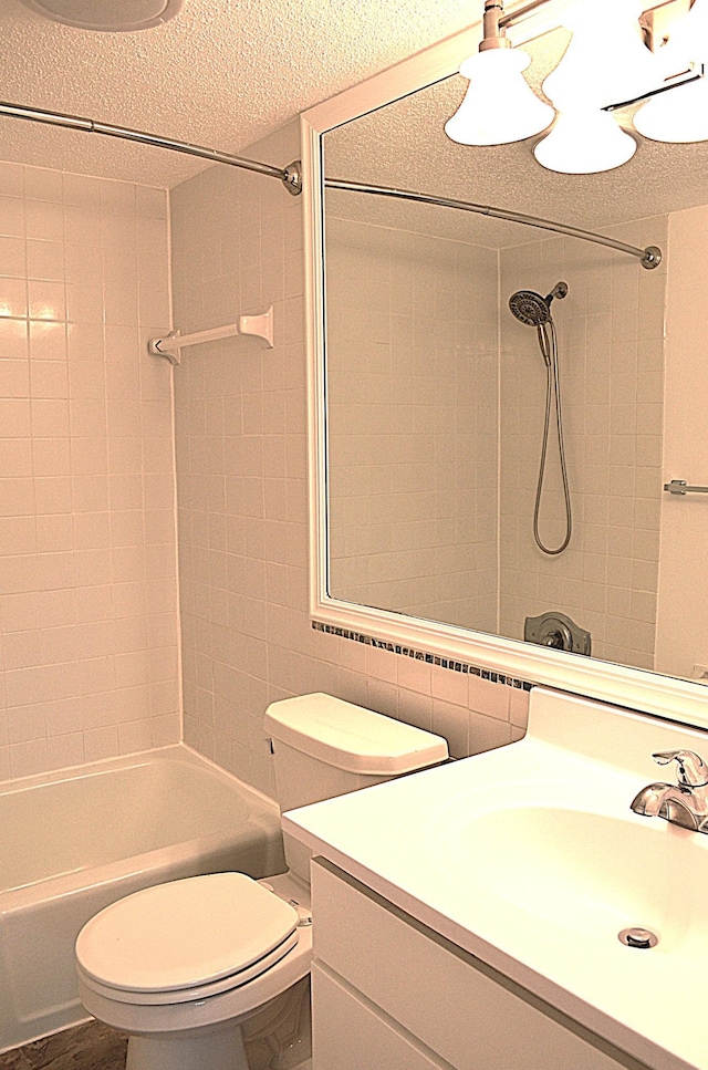 4387 Wilshire Blvd Unit 307, Mound, MN 55364 - bathroom with vanity, shower / tub combination, and a textured ceiling