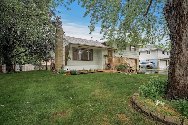 2932 Winnetka Ave N, New Hope, MN 55427 - view of front of house with a chimney, a wooden deck, and roof with shingles