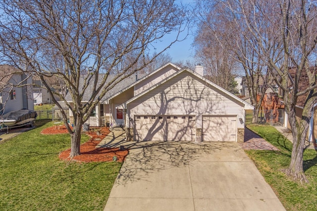7175 Upper 157th St W, Apple Valley, MN 55124 - view of front of house with a chimney, driveway, a front lawn, and an attached garage