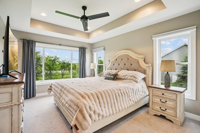 1623 Otter Way, New Richmond, WI 54017 - bedroom with a tray ceiling, light carpet, recessed lighting, and ceiling fan
