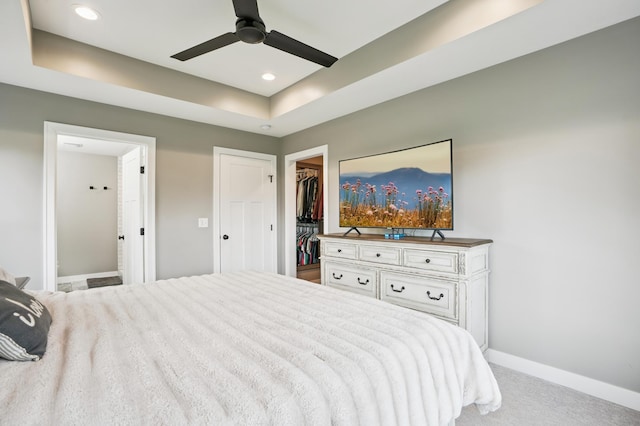 1623 Otter Way, New Richmond, WI 54017 - bedroom with a walk in closet, a raised ceiling, carpet floors, a closet, and a ceiling fan