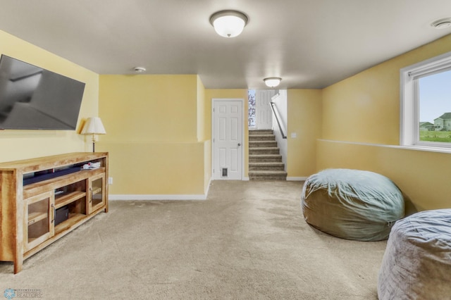 1334 6th St NW, Fargo, ND 58078 - sitting room with carpet flooring and stairs