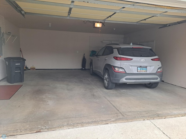 5409 University Dr S Unit D, Fargo, ND 58104 - garage featuring a garage door opener