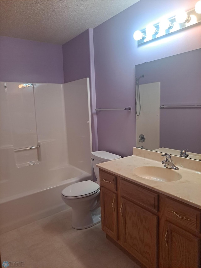 5409 University Dr S Unit D, Fargo, ND 58104 - full bathroom with vanity, a textured ceiling, and shower / washtub combination