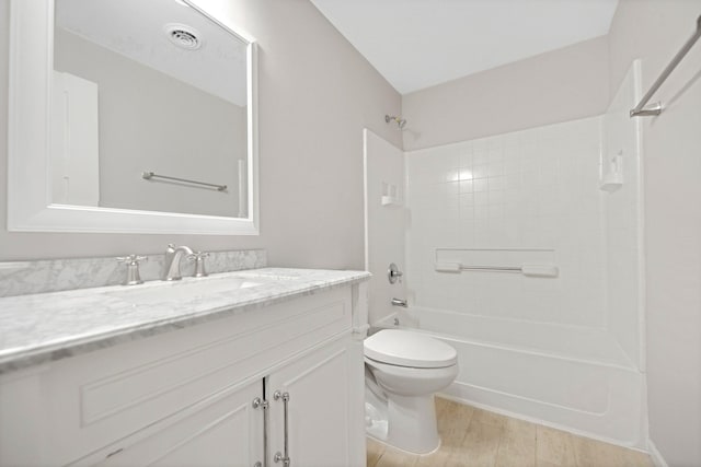 6758 Troy Ln N, Maple Grove, MN 55311 - full bathroom featuring vanity,  shower combination, and wood finished floors