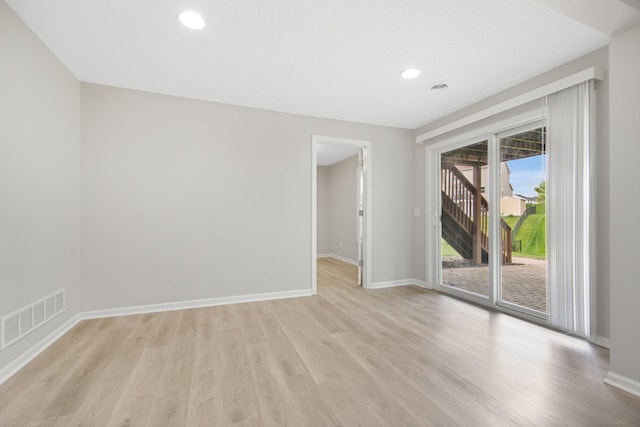6758 Troy Ln N, Maple Grove, MN 55311 - spare room with light wood-type flooring and recessed lighting