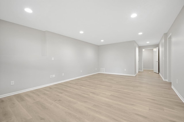 6758 Troy Ln N, Maple Grove, MN 55311 - unfurnished room with light wood-style flooring and recessed lighting