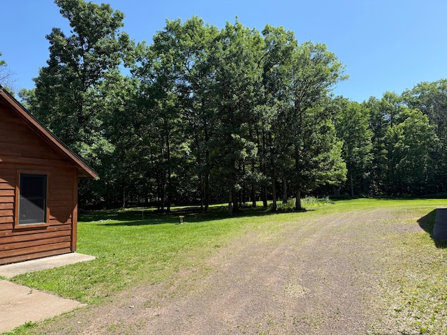43564 Tamarack River Rd, Ogema Twp, MN 55037 - view of grassy yard featuring a view of trees