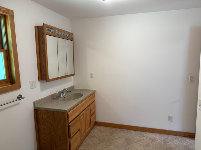 43564 Tamarack River Rd, Ogema Twp, MN 55037 - bathroom featuring vanity and baseboards