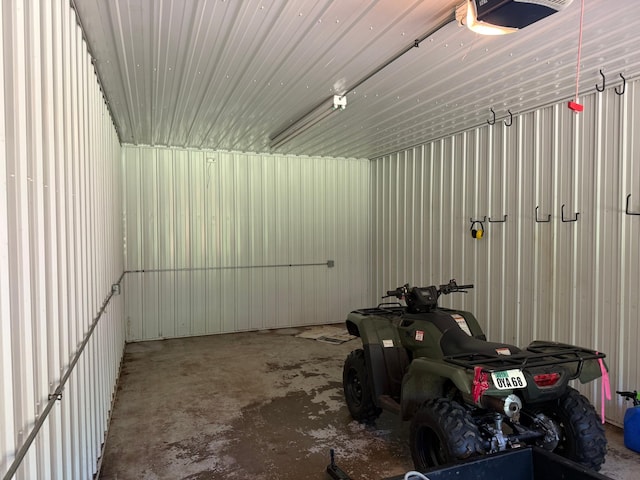 43564 Tamarack River Rd, Ogema Twp, MN 55037 - garage featuring a garage door opener