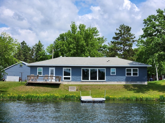 207 Mill Rd, Park Rapids, MN 56470 - rear view of house featuring a water view and a yard