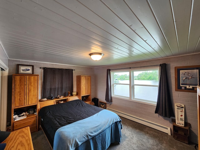 207 Mill Rd, Park Rapids, MN 56470 - carpeted bedroom featuring a baseboard radiator, wooden ceiling, and brick wall