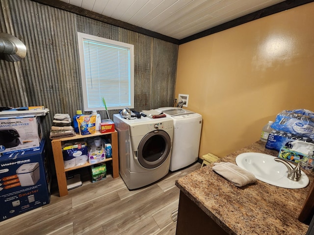 207 Mill Rd, Park Rapids, MN 56470 - washroom with washer and dryer, wood finished floors, wooden ceiling, and crown molding